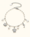 Silver-Tone Sea Turtle Multi-Charm Bracelet